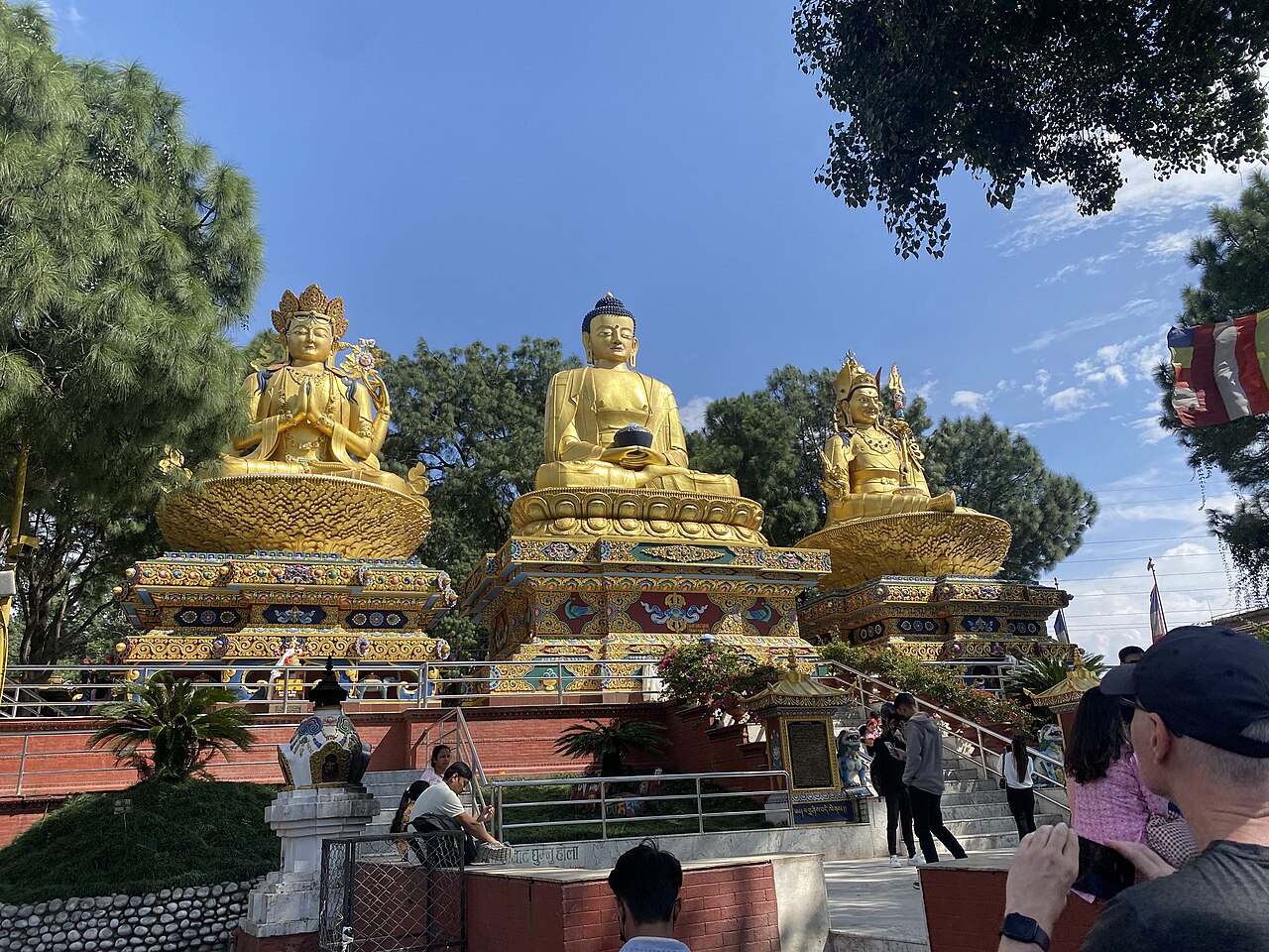 Three monumental golden statues in Amideva Buddha Park