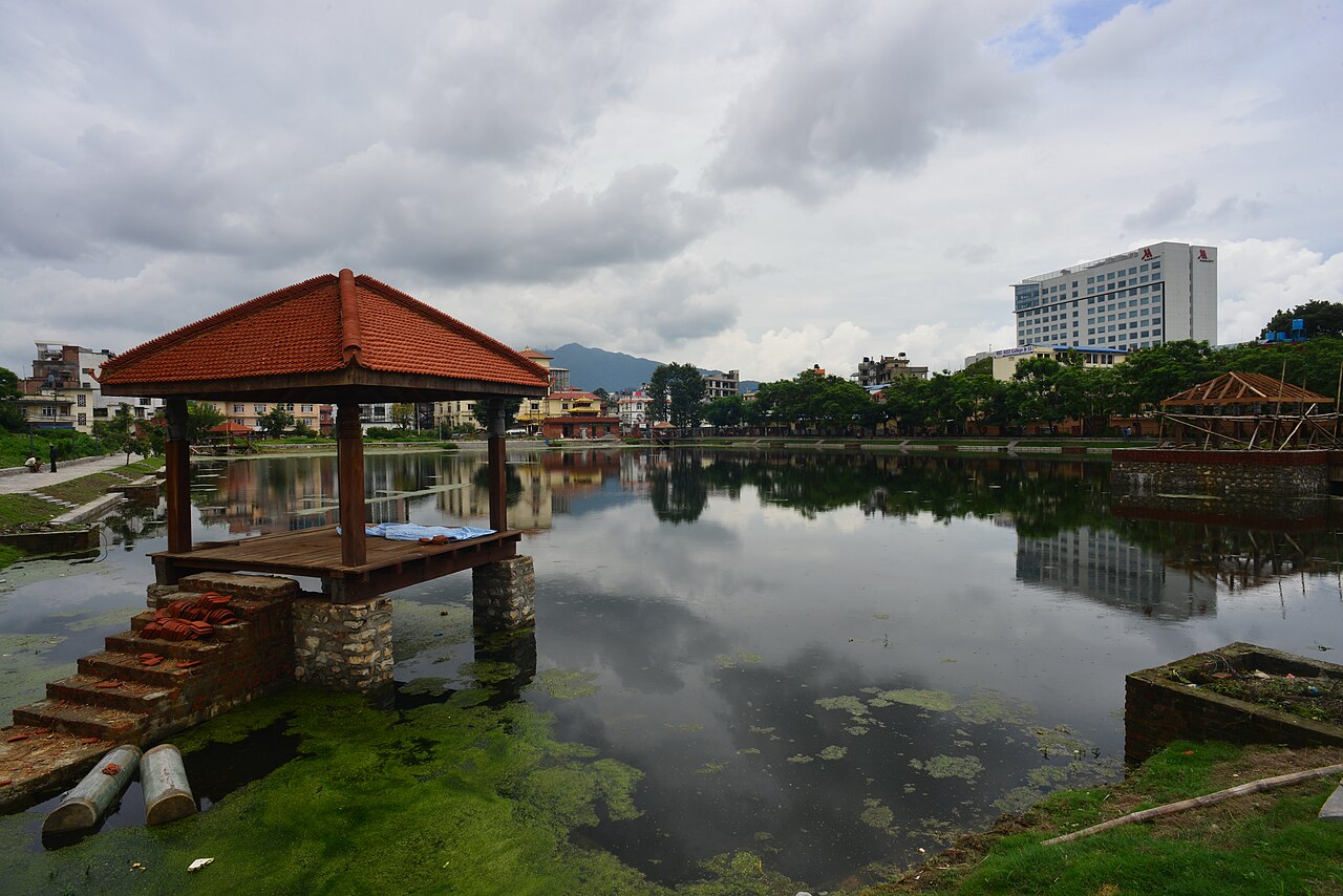 Pavilion and reflections beside Kamal Pokhari in Kathmandu