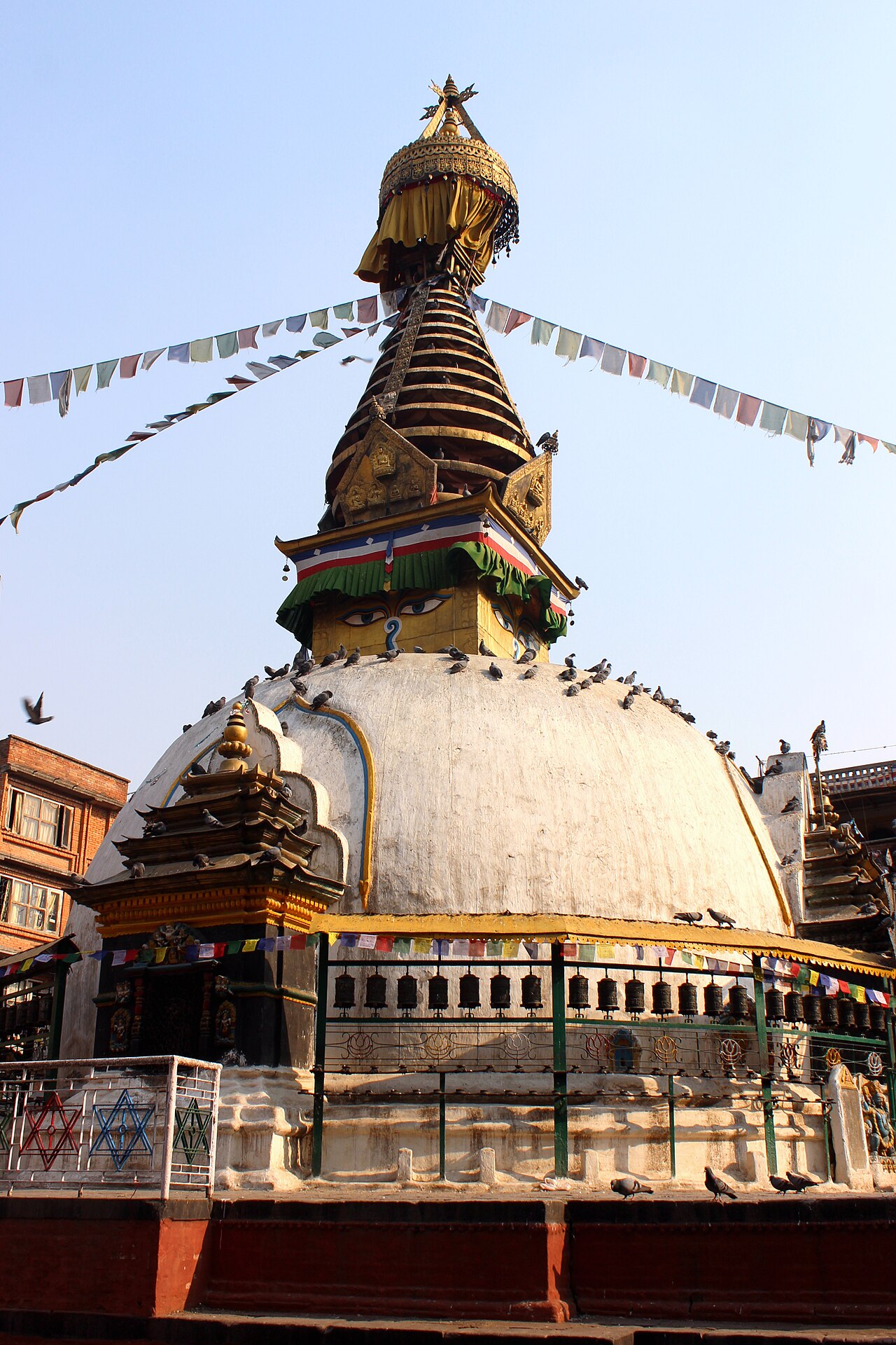 Kathesimbhu Stupa and prayer flags in its Kathmandu courtyard