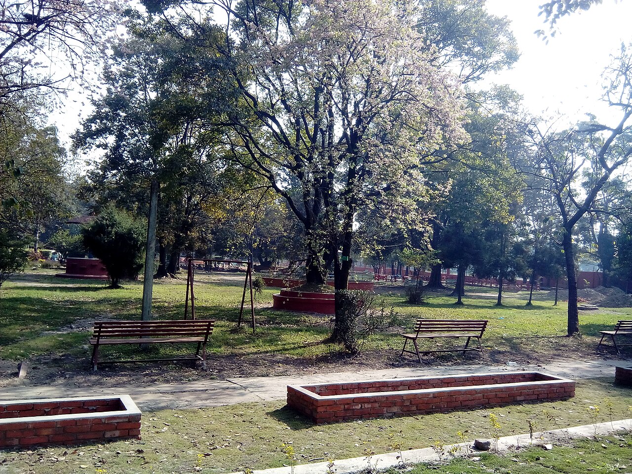 Trees and planted garden beds inside Ratna Park
