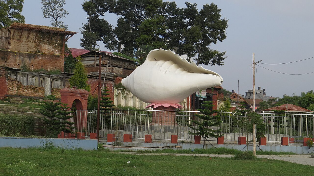 Large white conch sculpture in Shankhamul Park